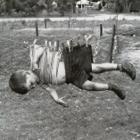 kid-on-clothesline-300x300