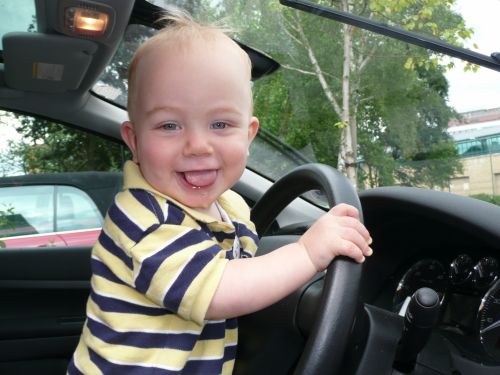 little-2-years-old-boy-drives-a-car